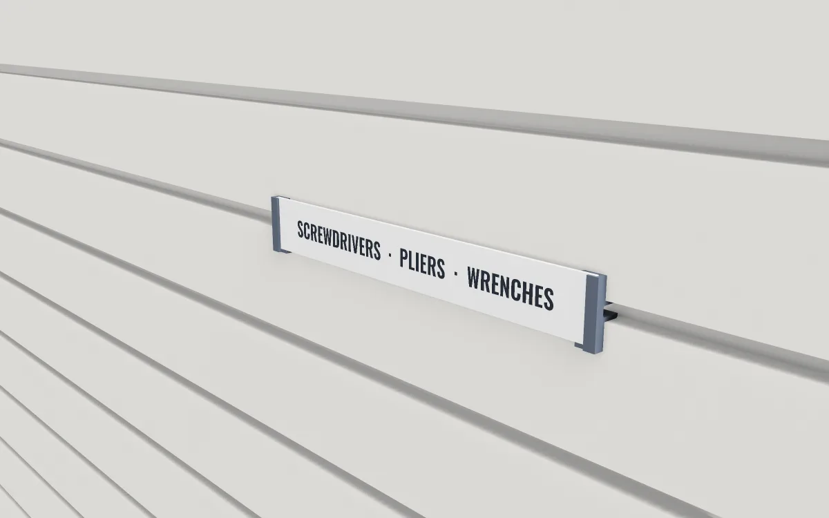 Groove label strip · Retail channel 240 mm on a slatwall, 3D render