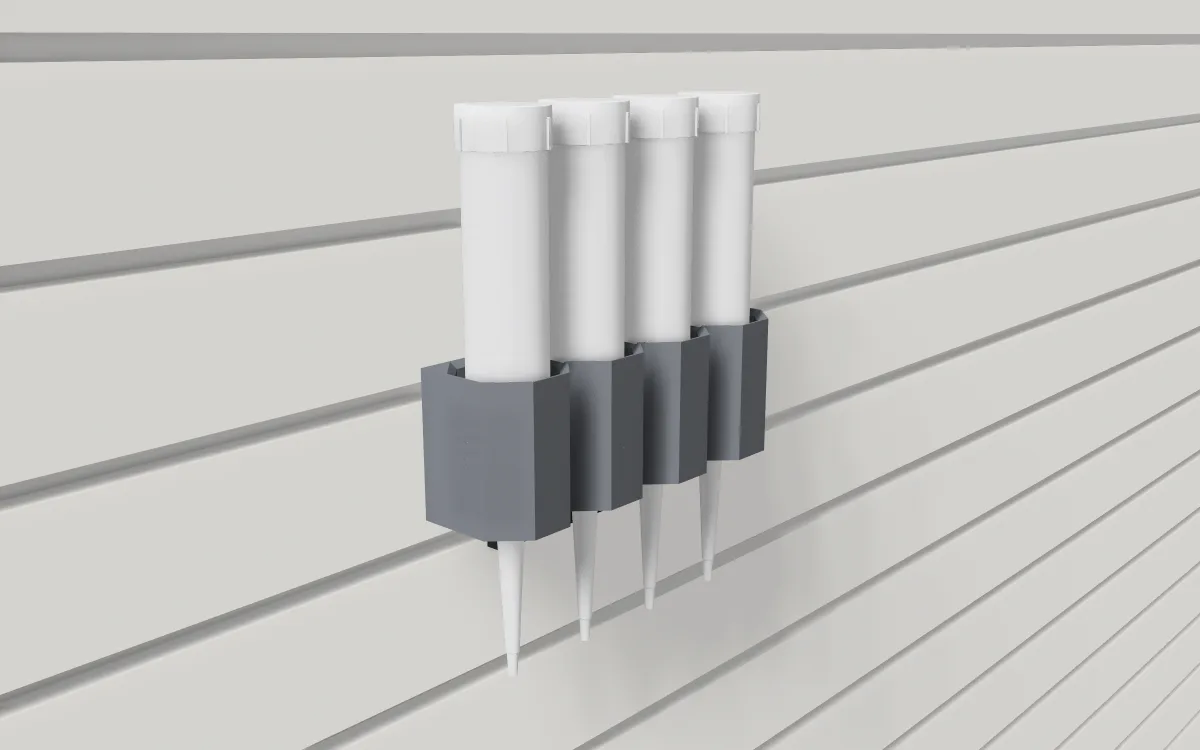 Caulk tube rack on slatwall, holding four caulk tubes