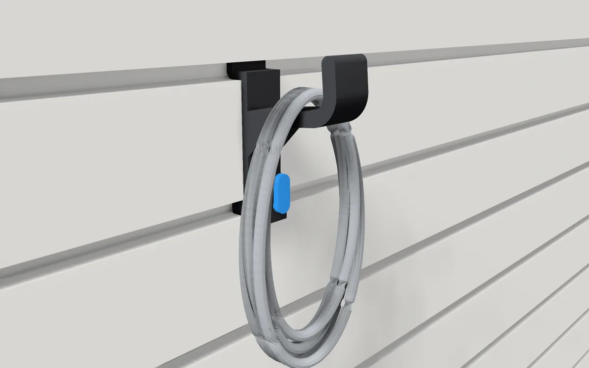 J-hook on slatwall, holding a coiled cable