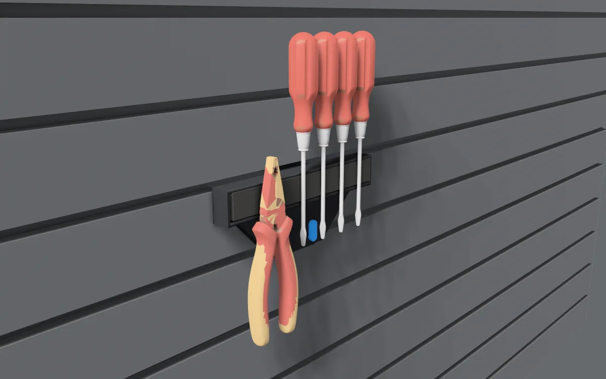 Magnetic tool bar on slatwall, holding four screwdrivers and a pair of pliers