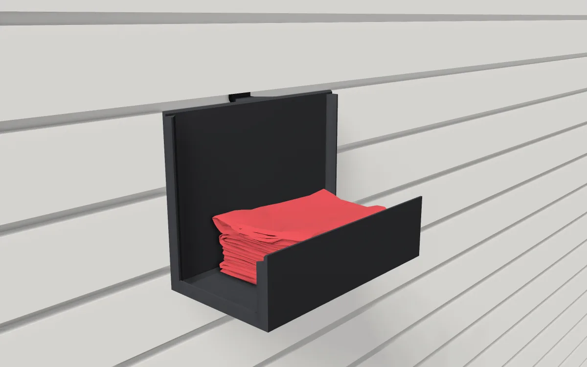 Rag holder on slatwall, holding a stack of folded rags